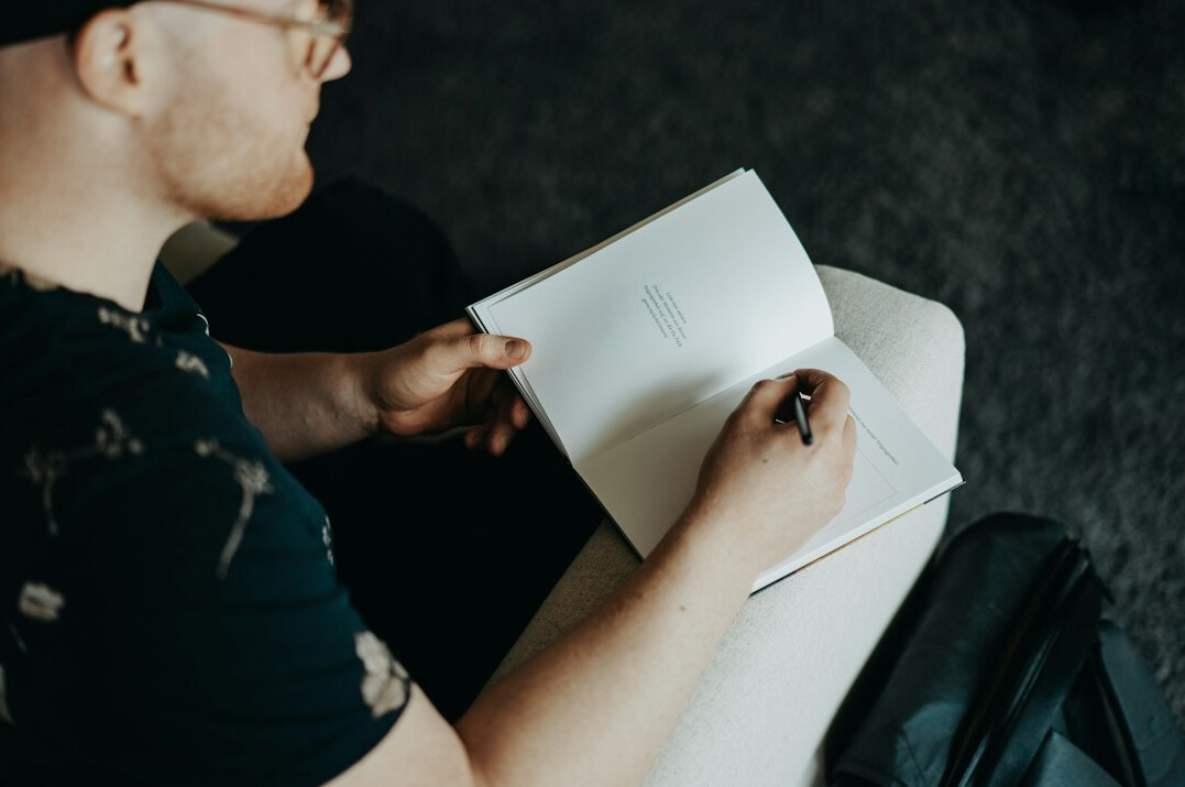 person journaling thoughts