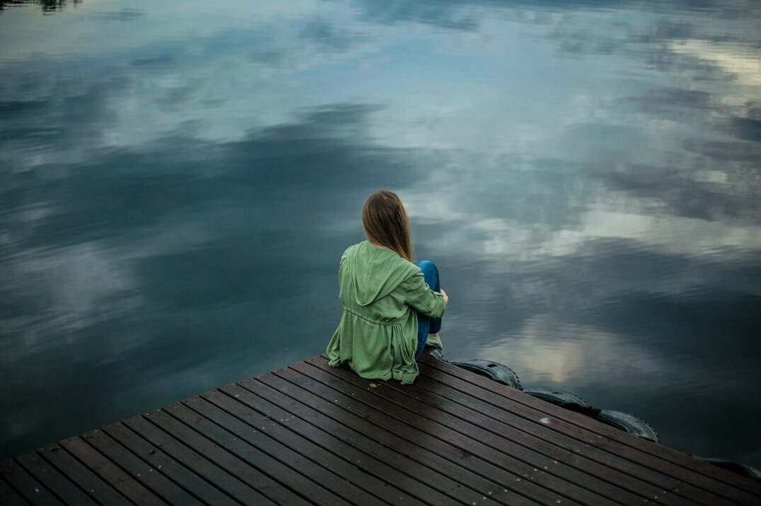 person reflecting alone